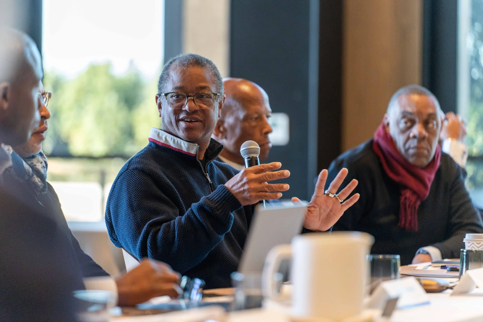 JUST Society members in discussion during a panel at the annual members meeting